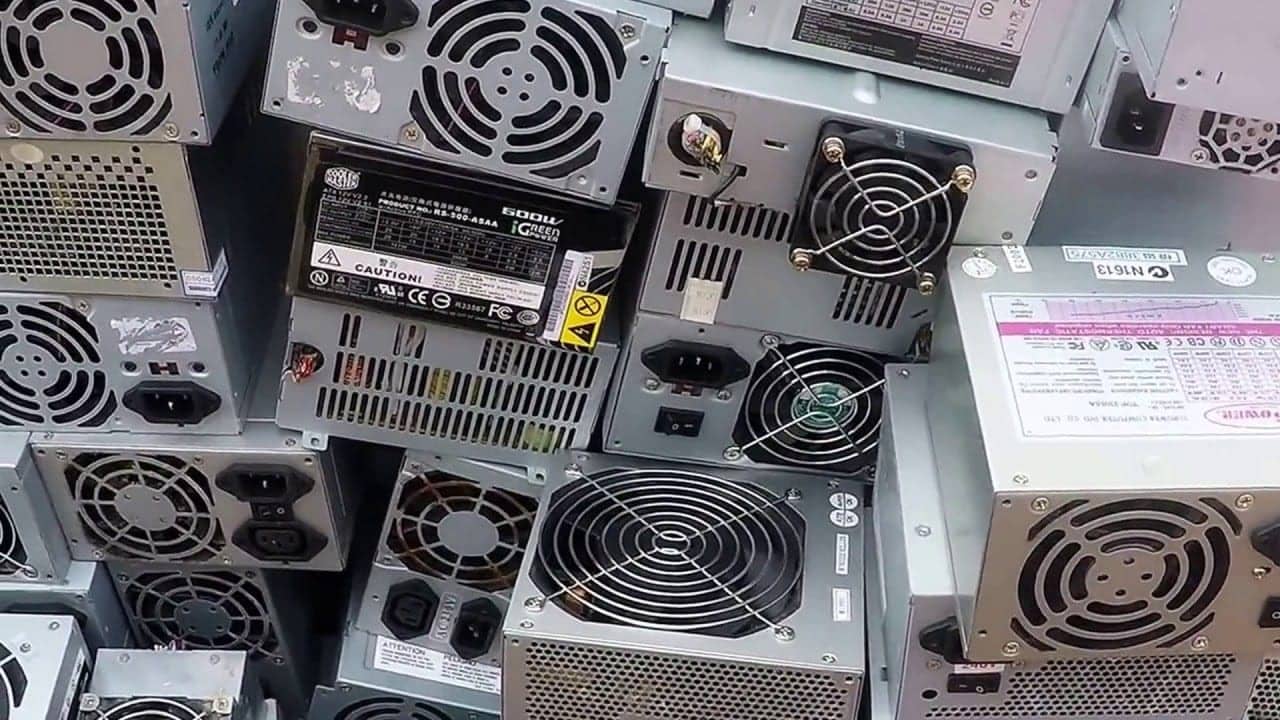 Stack of old computer power supply units