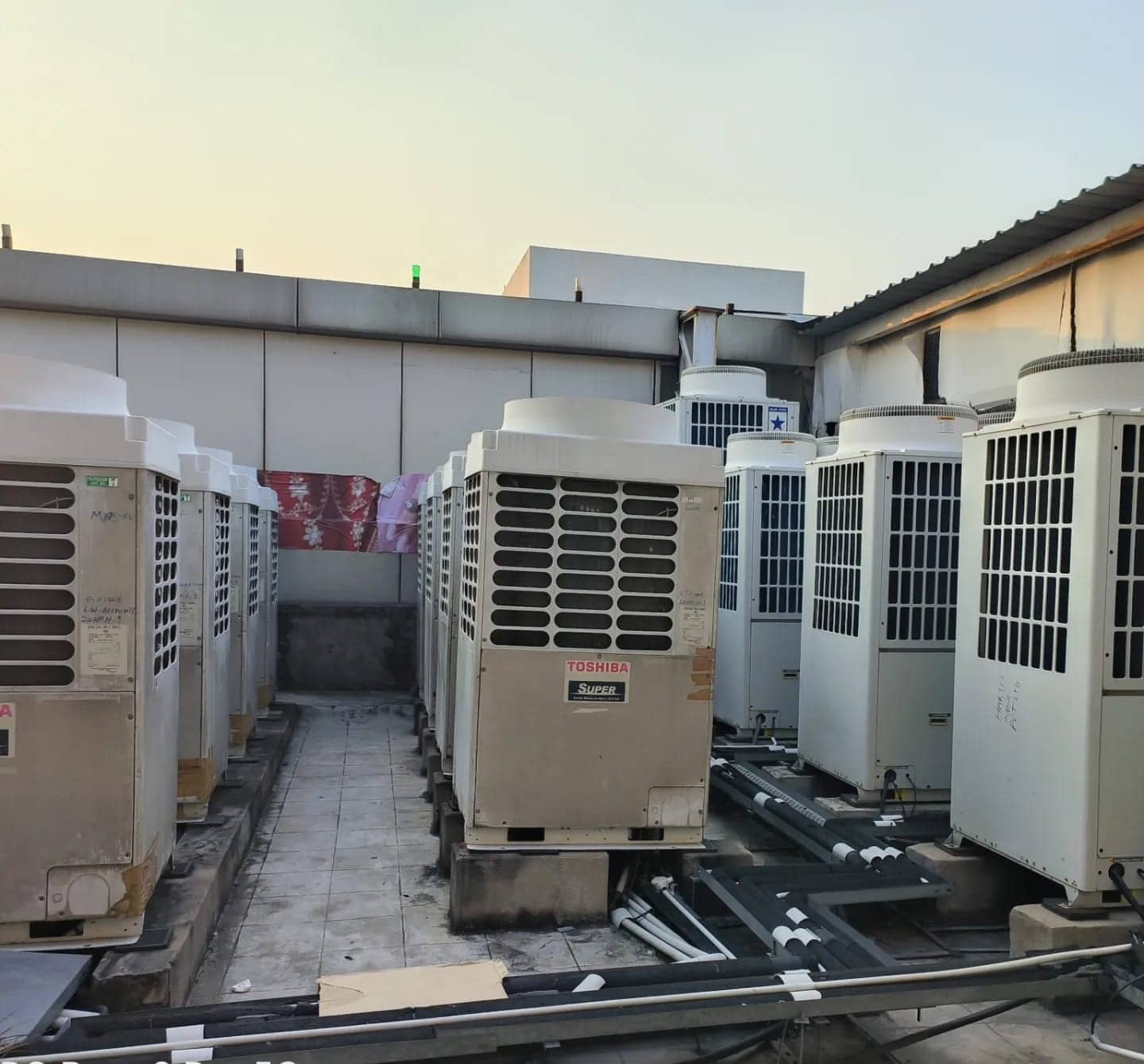 Row of VRF outdoor air conditioning units on a commercial rooftop